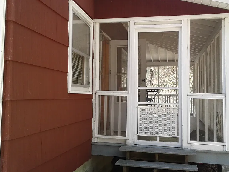 steps to screened in porch and main entrance