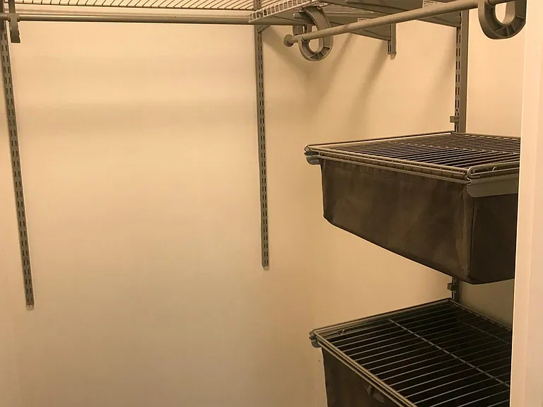 Walk In Closet In Primary Bedroom