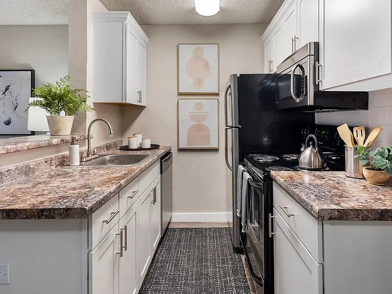Our galley-style kitchens are designed for efficiency and convenience, with modern upgrades and stainless-steel appliances.