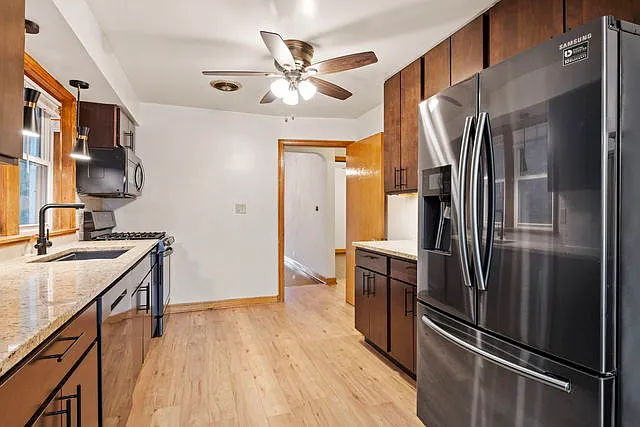 Building Photo - 5013 N Mango Ave #2