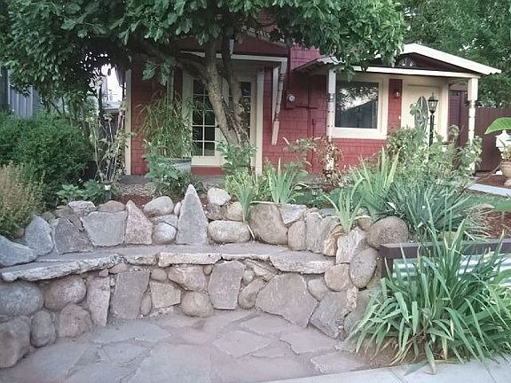 Stone Bench by sidewalk