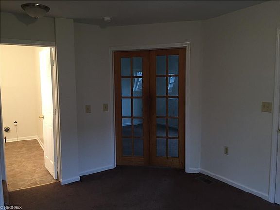 French doors into the living room area from the dining room