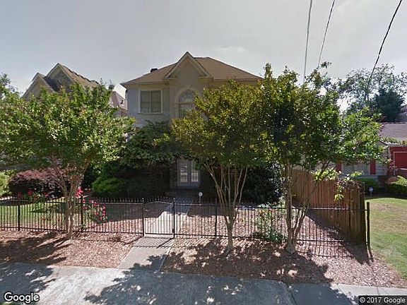 Front yard has fenced and gated access to the main road and you can walk right to Walmart next door.