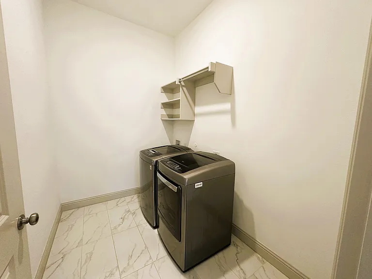 Laundry room furnished with Washer and Dryer