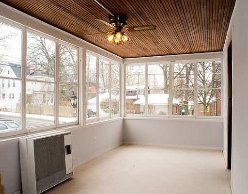 Sunroom next to Kitchen...Playroom? Enlarge the Kitchen?