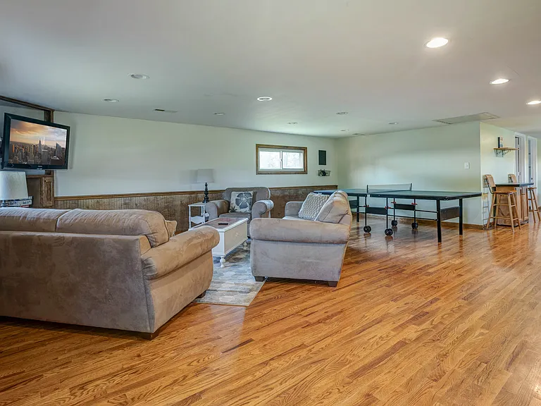 Upper level living room & game room.