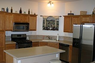 Corian counters, stainless steel appliances