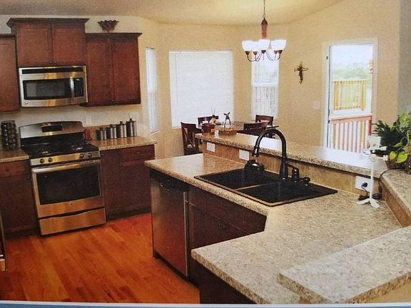 Kitchen with stainless steel appliances