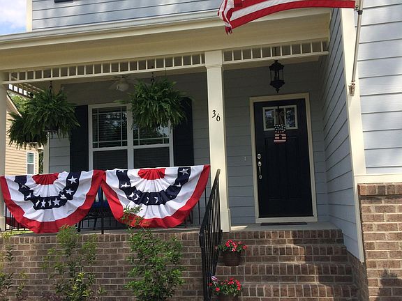 Front porch with fern hangers