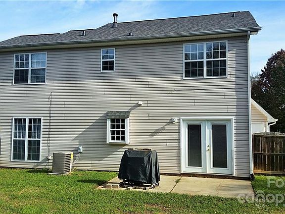 fenced back yard. French doors to kitchen