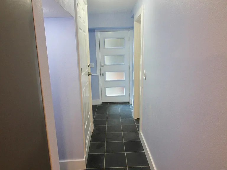 Entry way with door that lets in lots of light
