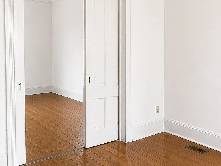 Rendering of front room with white walls.