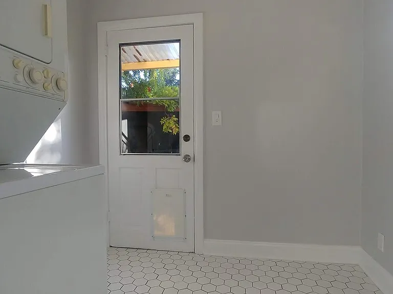 Service Porch with washer and dryer.