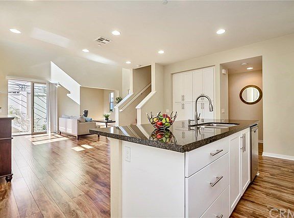 View from kitchen island looking out to great room.