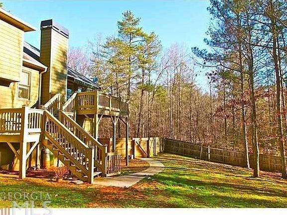 TWO wonderful decks off the back of the house, overlooks a huge private fence yard.