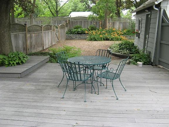 Backyard/privacy fencing/huge deck with maple tree canopy/room to garden.
