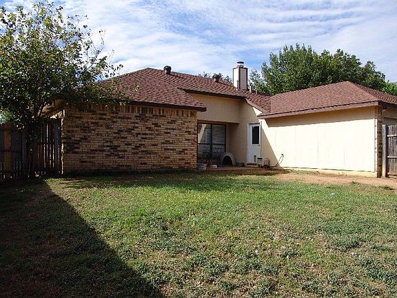 Nice size backyard with covered porch