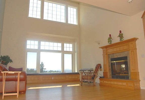 Family room w/2 story floor to ceiling windows