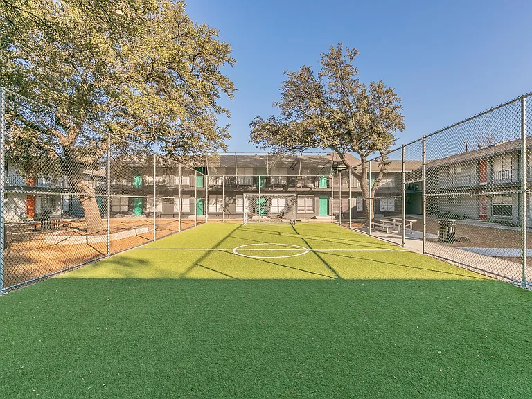 Stay active at the soccer field and green recreation area at Chapel Creek Apartments.