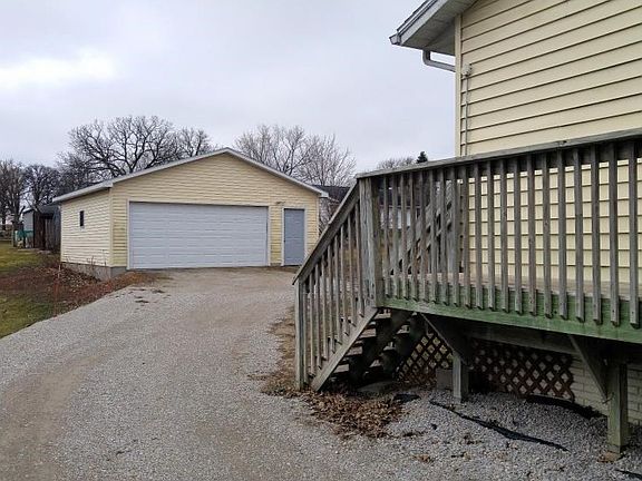 View of over-sized 2 stall garage from side entry of home