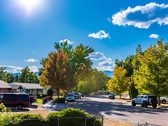 Beautiful mature trees and peak views from the front door.