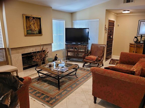 Living room looking back to front door.
