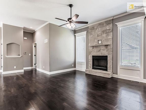 Extra cable and outlet added above fireplace for buyers convenience