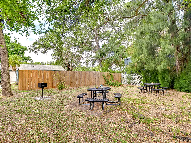 We have four picnic benches in the courtyard area along with two charcoal grills