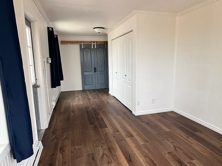 Main entrance looking toward the master bedroom doors.