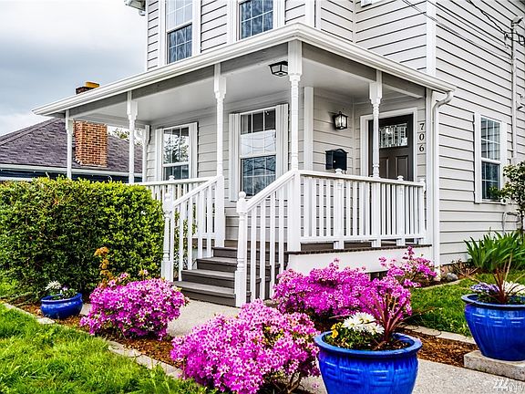 New front door and a covered porch is a warm welcome