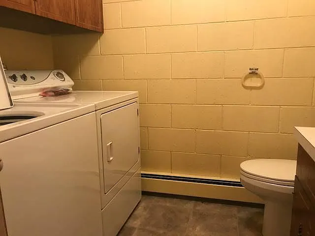 downstairs laundry, shower and bathroom.