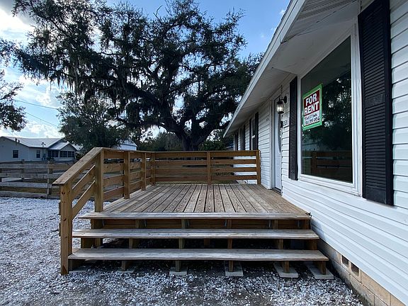 Large front deck with picture window