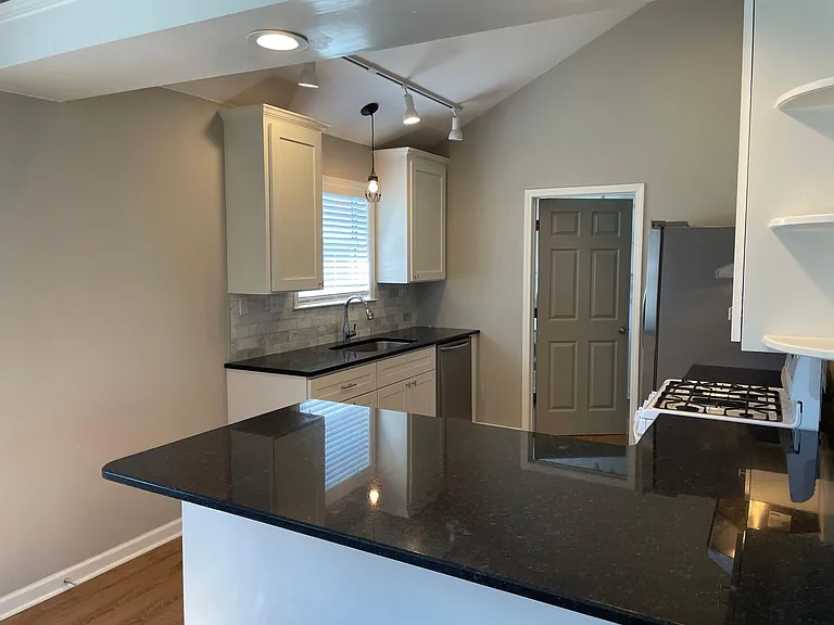 Kitchen, new lower cabinets, fridge and dishwasher