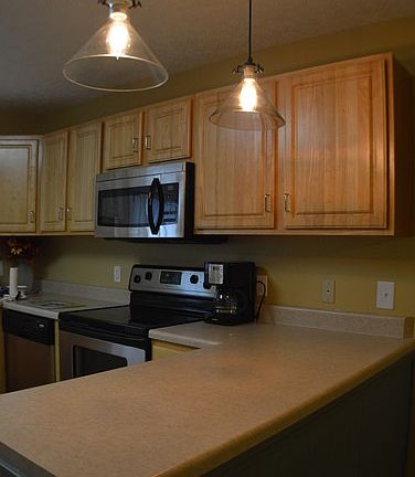 Neutral colored wood cabinets
