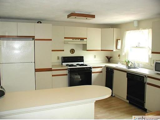Cabinet filled Kitchen