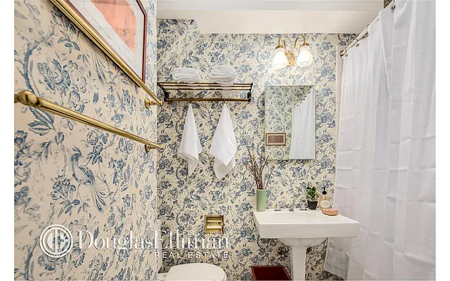 Sold by Douglas Elliman | media 18