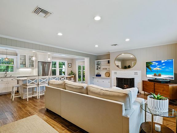 Open concept living/dining/kitchen space.