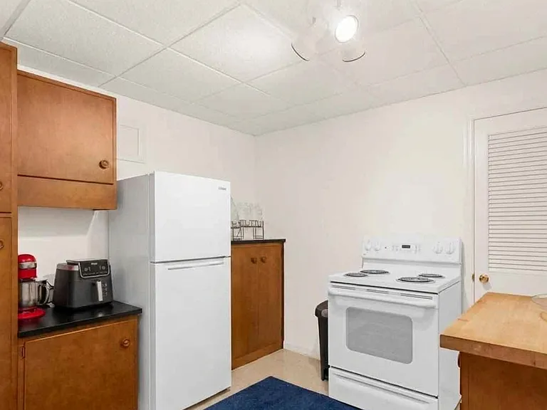 Kitchenette downstairs in basement. Talk about generational living!