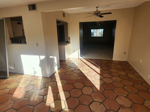 Looking from AZ room into dining area and into front room. Kitchen is on the left