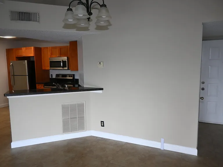8721 Wiles Rd #305 — Photo 41