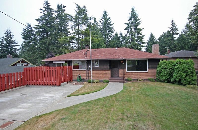 Large level backyard is perfect for enjoying all year round.