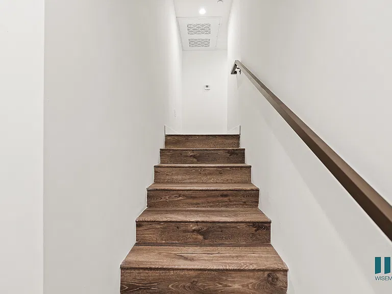 Stairway Leading to Upper Level of Unit