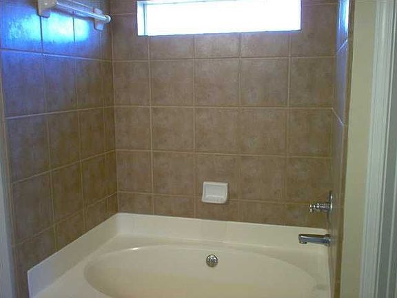 Tiled shower and garden tub