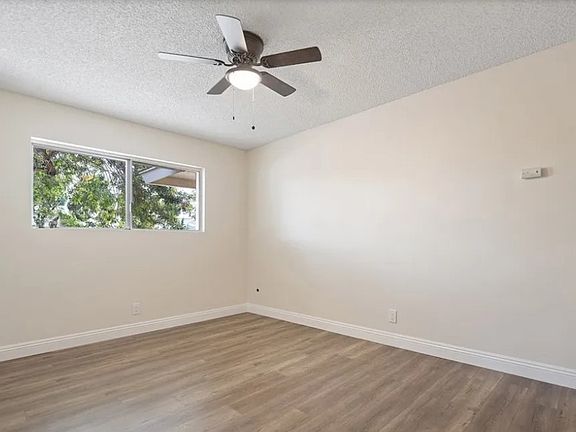 bedroom 3 with ceiling fan