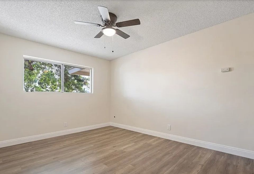 bedroom 3 with ceiling fan