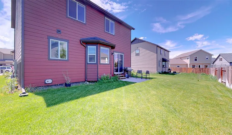 Enjoy two spacious levels of living, partially fenced yard and an attached 2 car garage and driveway