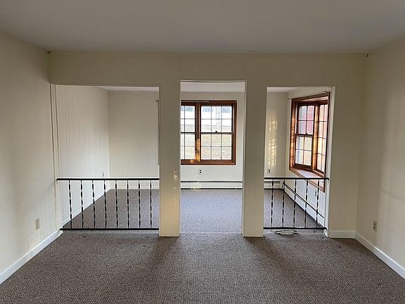 Back part of family room and back den or office area.