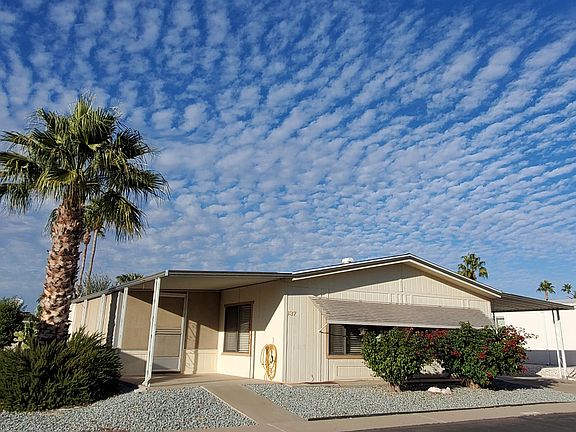 Side of home with Arizona room