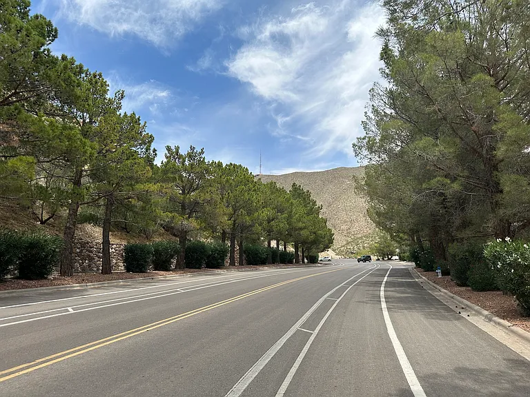 Tree-lined Stanton Street leading to Camelot