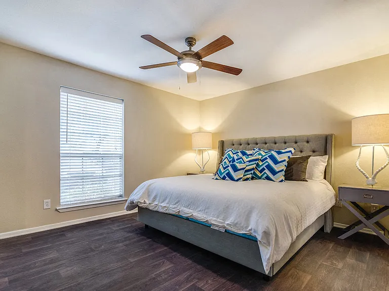 Upgraded ceiling fans in living rooms and bedrooms